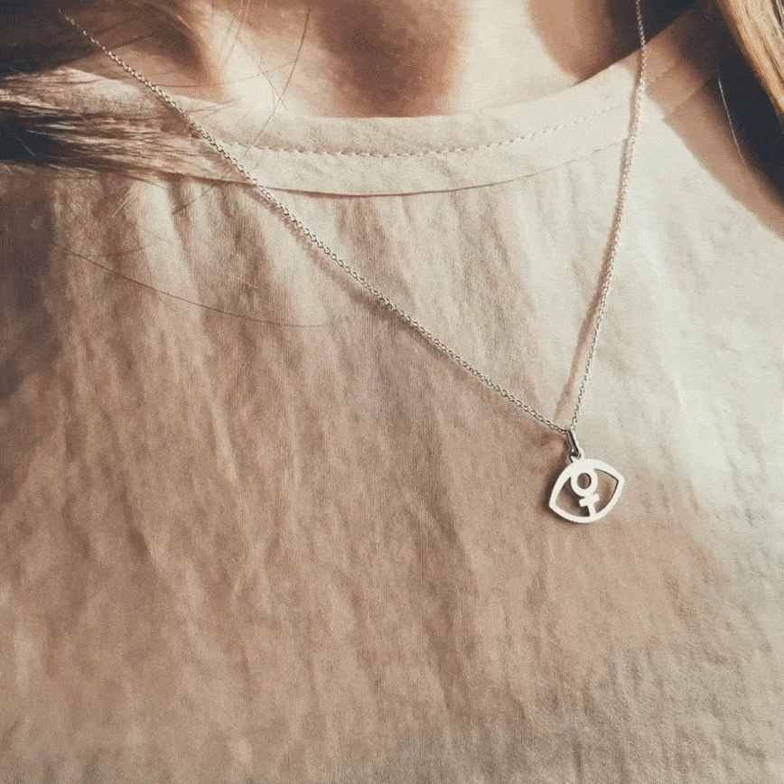 Feministöga hängsmycke silver
