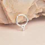 Septumring med kvinnotecken