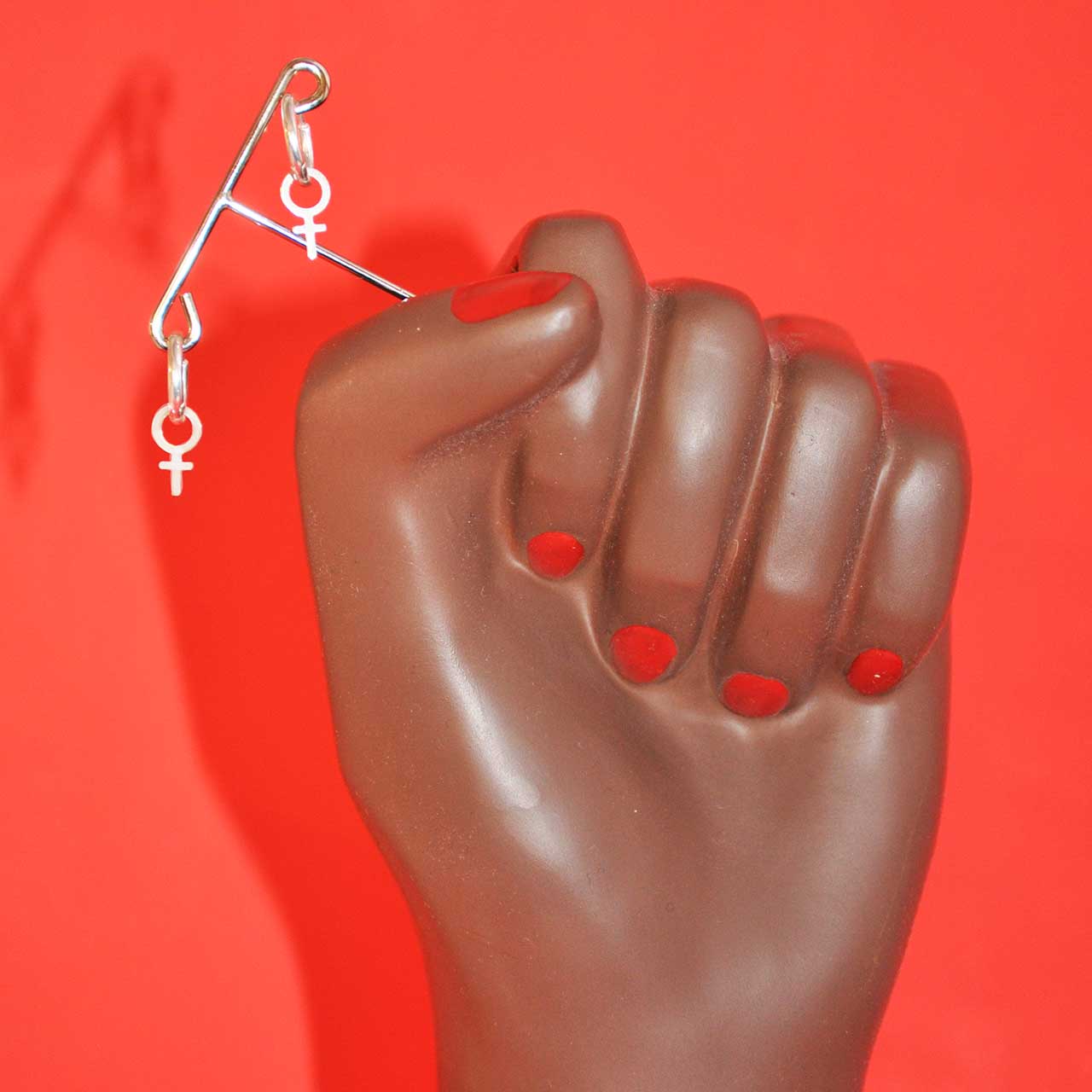 Systerskaps örhängen - Feministsmeden